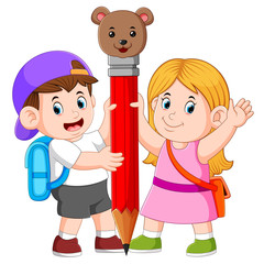 the boy and the girl is holding the big pencil