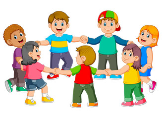 the children are holding to each other for making a round 