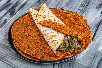 Traditional Turkish Cuisine: Lahmacun turkish delicious pizza with minced beef or lamb meat,...