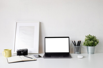 Workspace desk and laptop. copy space and blank screen. Business image, Blank screen laptop and supplies.