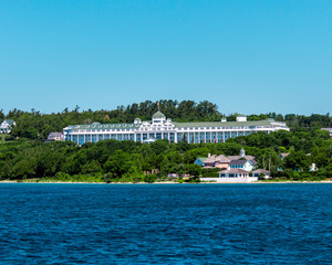 Fototapeta na wymiar The Grand Hotel on Mackinac Island from a cruise ship sailing by the island