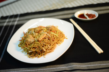 Singapore style fried rice noodle, setup nicely on a table ready to serve
