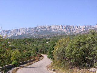 winding mountain road serpentine in the mountains panoramic view for tourists