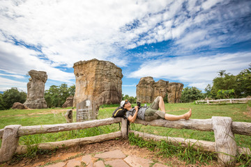 Photographapher woman on Stonehenge of Thailand, Mo Hin Khao in Phu Lan Kha National Park,...