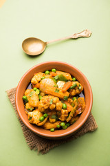 Mix vegetable curry - Indian main course recipe contains Carrots, cauliflower, green peas and beans, baby corn, capsicum and paneer/cottage cheese with traditional masala and curry, selective focus