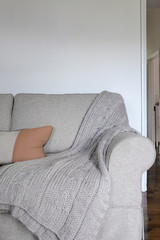 Comfy sofa with throw