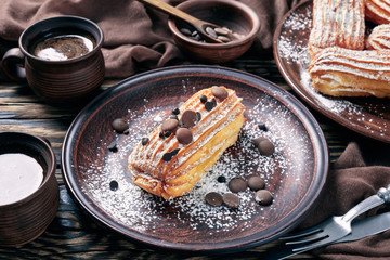 close-up of delicious Homemade Eclairs on a plate