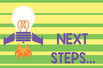 Writing note showing Next Steps. Business concept for something you do or plan after you ve finished something else Top view launching bulb rocket fire base Project Fuel idea