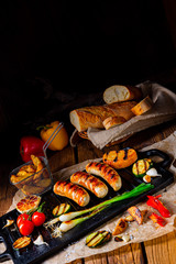 Delicious  grilled sausage with various grilled vegetables