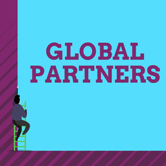 Text sign showing Global Partners. Business photo text Two or more firms from different countries work as a team One male human person climb up the tall high wall use short ladder stairway