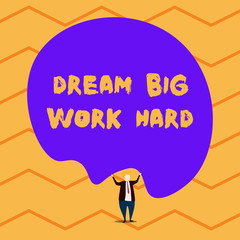 Text sign showing Dream Big Work Hard. Business photo showcasing Believe in yourself and follow the dreams and goals Male human wear formal tuxedo hold asymmetrical shape bubble use both hands