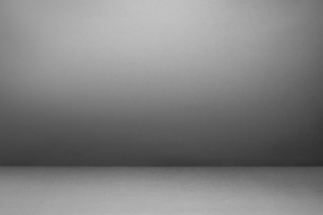 Empty Grey with Black vignette Studio well use as background.