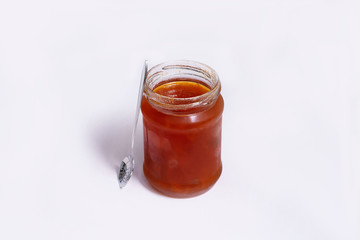 Fototapeta na wymiar Glass jar of jam on a white background
