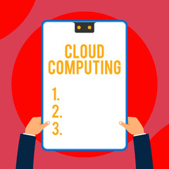Text sign showing Cloud Computing. Business photo text use a network of remote servers hosted on the Internet Two executive male hands holding electronic device geometrical background