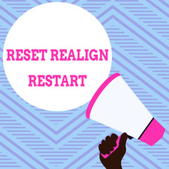 Text sign showing Reset Realign Restart. Business photo showcasing Life audit will help you put things in perspectives Hand Holding Loudhailer Empty Round Speech Text Balloon Announcement New