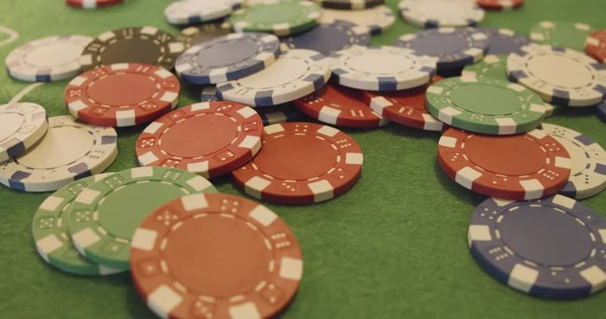 Casino Tokens/Chips/Checks Dropping On Table - Slow Motion