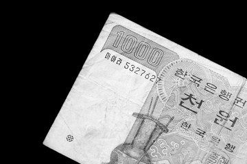 Outdated 1000 Korean Won banknote of 1983 year close up. Black and white
