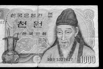Outdated 1000 Korean Won banknote of 1983 year close up. Black and white
