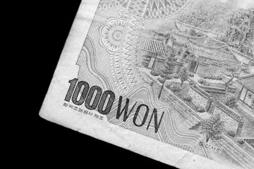 Outdated 1000 Korean Won banknote of 1983 year close up. Black and white
