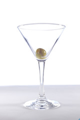 Empty glass with olives