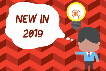 Writing note showing New In 2019. Business concept for what will be expecting or new creation for the year 2019 Standing man tie holding plug socket light bulb Idea Startup