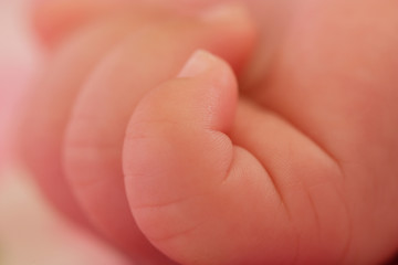 Obraz na płótnie Canvas 可愛い赤ちゃんの指のアップ写真