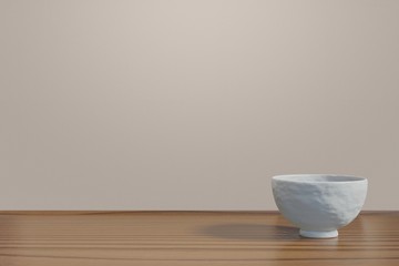 Japanese white rice bowl (empty) on a wood table (corner)