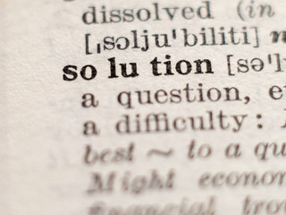 Dictionary definition of word solution, selective focus.