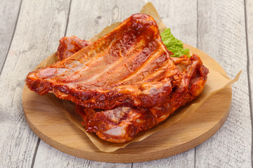 Raw marinated pork ribs