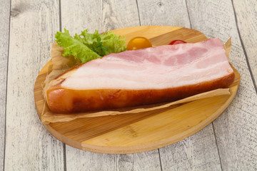 Smoked pork breast with salad leaves