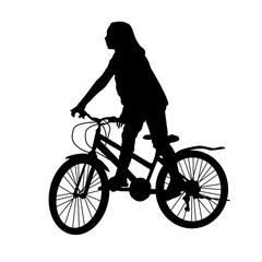 Obraz na płótnie Canvas Girl silhouette riding a bike