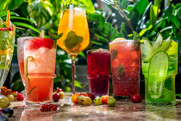Colorful cocktails on the bar table in restaurant.