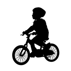 Little boy silhouette riding a bike