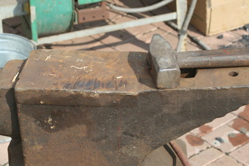 Hammer lies on anvil close-up