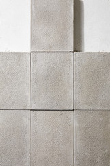 Fototapeta premium Grey stone bricks on the floor with two white empty area.