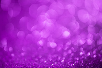 Lilac glitter christmas abstract background. Defocused sequin light.