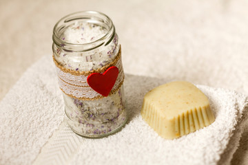 Soap and sea salt on a white bath towel