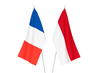 National fabric flags of France and Indonesia isolated on white background. 3d rendering illustration.