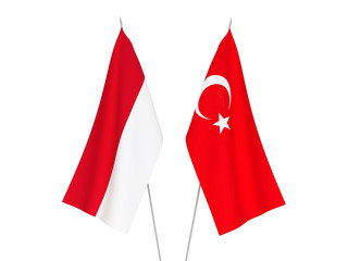 Obraz premium National fabric flags of Indonesia and Turkey isolated on white background. 3d rendering illustration.