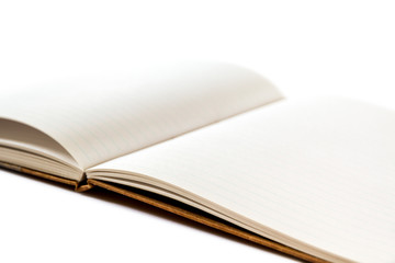 Open blank notebook closeup view