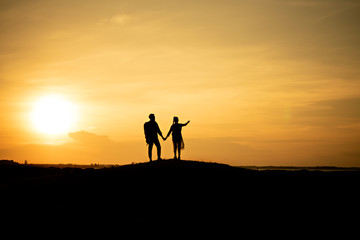 Silhouette traveler couples walking