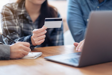 Businessman using credit card for purchasing and shopping online