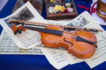Fototapeta na wymiar Violin bow on the background music. Wooden musical instruments Leisure Hobbies.