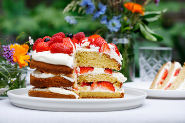 Scandinavian midsummer feast with strawberry cake