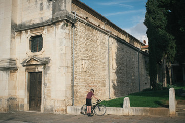 Fototapeta na wymiar Riding bikes ans exploring old cities of Istria