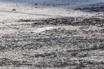Burned tire rubber from a drift