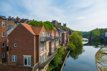 Fototapeta na wymiar Traditional buildings along the bank of River Wear, Durham, England