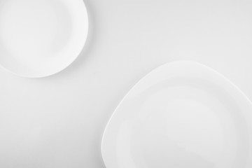 Empty white plate isolated on white background. diet concept.