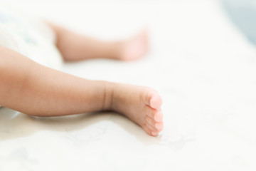 baby feet on white background