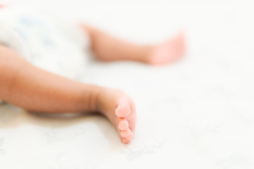 baby feet on white background